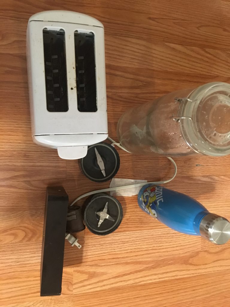 1. & 2. bullet blender blades, 3. A glass jar that grossed me out when I emptied the contents, 4. A water bottle, 5. A hard drive enclosure, 6. A reusable K-cup, Bonus: A toaster
